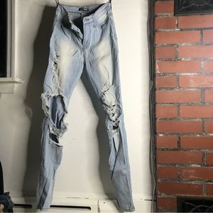 Size 1 Y2K High Waisted Destroyed Light Wash Jeans